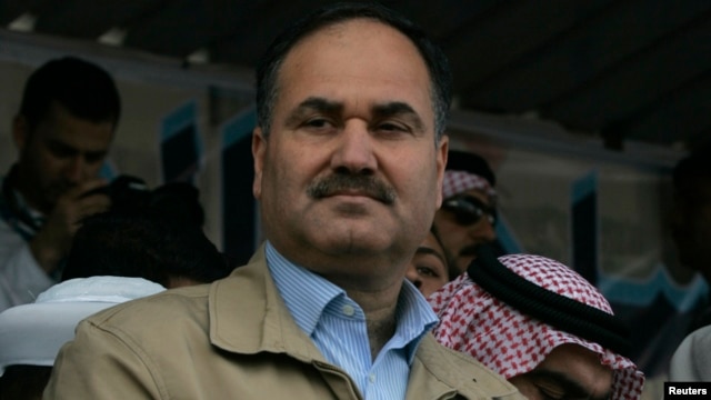 Iraqi Finance Minister Rafie al-Issawi attends an anti-government demonstration in Ramadi, 100 km (62 miles) west of Baghdad, March 1, 2013.
