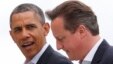 U.S. President Barack Obama walks with Britain's Prime Minister David Cameron during the G8 summit at the Lough Erne golf resort in Enniskillen, Northern Ireland, June 18, 2013.