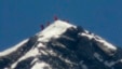 A team of climbers, including 80-year-old Japanese mountaineer Yuichiro Miura, stand on the summit of Mount Everest, in this photo taken by Kyodo, May 23, 2013. 