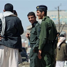 Yemeni police are seen at a checkpoint in the capital San'a, Yemen, 01 Nov 2010