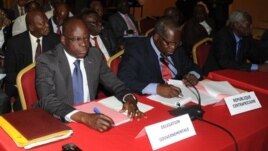Central African Republic delegation awaits opening of peace talks with the Seleka rebel alliancein Libreville, Gabon, Jan. 9, 2013