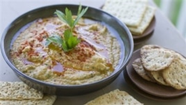 Farmers who grow chick peas, which is used to make hummus (above), worry a proposed farm bill encourages growers to plant whatever crop would give the biggest federal payout, rather than what the market calls for.