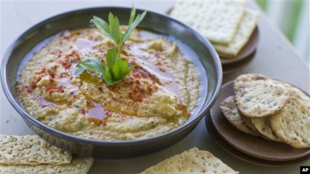 Farmers who grow chick peas, which is used to make hummus (above), worry a proposed farm bill encourages growers to plant whatever crop would give the biggest federal payout, rather than what the market calls for.