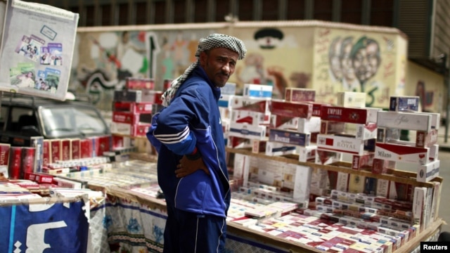 A vendor sells cigarettes on Cairo's Tahrir Square May 25, 2012.