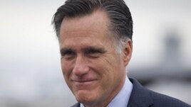 Republican presidential candidate, former Massachusetts Gov. Mitt Romney walks to his car to attend a fundraising event  in Nantucket, Massachusetts, Aug. 18, 2012.