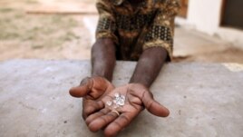 Rights group says nearly $2 billion worth of stolen diamonds has been going to cronies of President Robert Mugabe