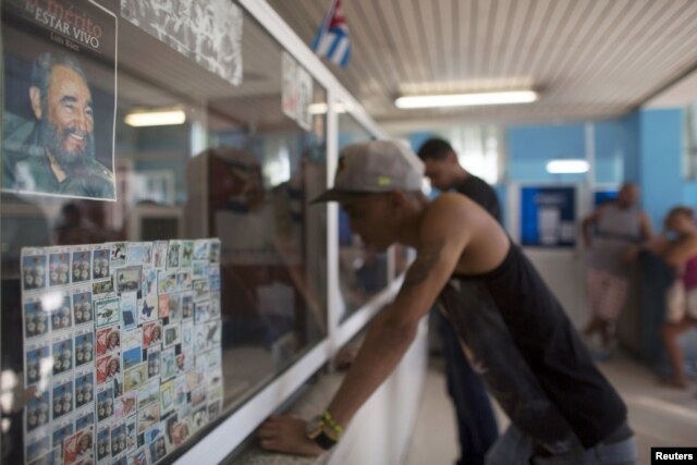 A picture of former Cuban President Fidel Castro is seen inside a post office in Havana, Dec. 11, 2015.