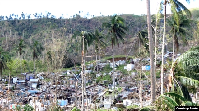 Scientists predict more extreme weather events like Typhoon Bopha which struck the Philippines in 2012, devastating homes. (OCHA)
