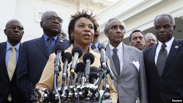 Rep. Barbara Lee, D-Calif., center, accompanied by fellow members of the Congressional Black Caucus, speaks to reporters outside the White House in Washington, following a meeting with President Barack Obama. (File Photo)