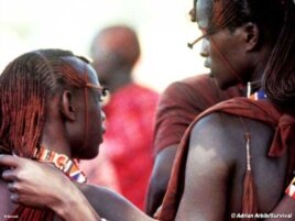 Two young Maasai men in conversation