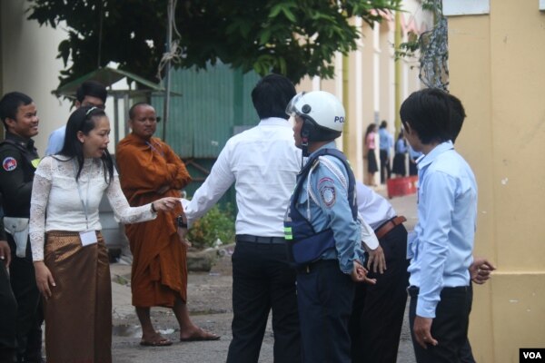 Police are guarding in front of Chak To Muk examination center to tighten the security on the grade 12 examination day on August 24th, 2015.