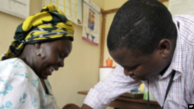 A  baby receives an injection in a malaria vaccine trial in the Kenya coastal town of Kilifi.