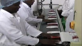 Two Degrees nutrition packets being produced at a factory in Malawi. (Courtesy Two Degrees)