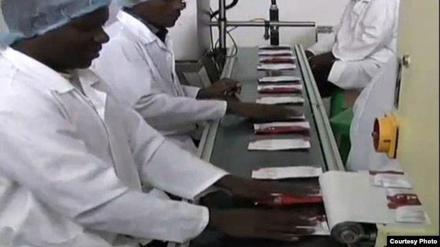 Two Degrees nutrition packets being produced at a factory in Malawi. (Courtesy Two Degrees)