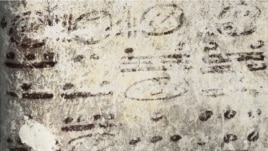 Four long numbers on the north wall of the ruined house relate to the Maya calendar and computations about the moon, sun and possibly Venus and Mars; the dates stretch some 7,000 years into the future. (Tyrone Turner © 2012 National Geographic)