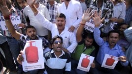 Activists of People’s Democratic Party shout slogans during a protest in Jammu, India, September 19, 2012. 