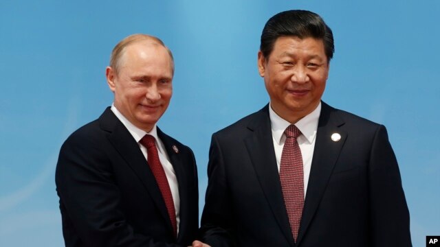 Tổng thống Nga Vladimir Putin và Chủ tịch Trung Quốc Tập Cận Bình.
