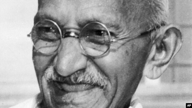 Indian leader Mohandas K. Gandhi, also known as Mahatma Gandhi, smiles in this 1947 file photo, location unknown.