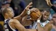Boston Celtics center Jason Collins (r) struggles for control of the ball with Sacramento Kings