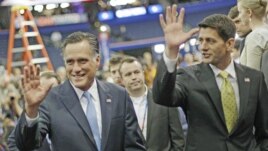 Republican presidential nominee Mitt Romney (l) and his vice presidential running mate Rep. Paul Ryan at the Republican National Convention in Tampa, Aug. 30, 2012.  