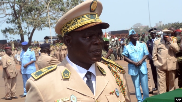Guinea's Brigadier General Namory Traore takes part in a funeral ceremony in Conakry, Guinea, Feb. 13, 2013.