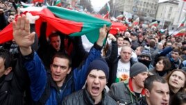 Thousands of demonstrators shout slogans protesting high utility bills and energy-sector monopolies, Sofia, Bulgaria, Feb. 24, 2013.