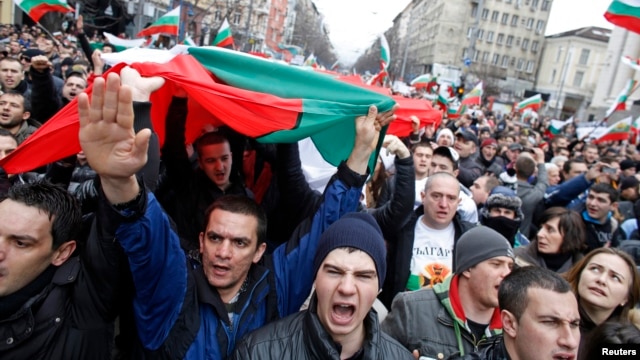 Thousands of demonstrators shout slogans protesting high utility bills and energy-sector monopolies, Sofia, Bulgaria, Feb. 24, 2013.
