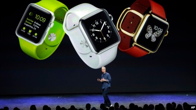 FILE - Apple CEO Tim Cook introduces Apple Watch in Cupertino, California, Sept. 9, 2014. 