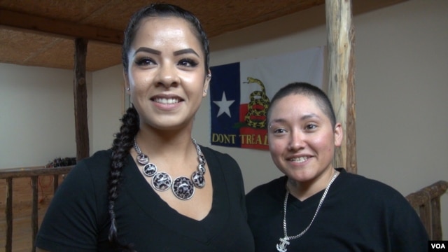 Desaree Reyes and her wife Marcella. (G. Flakus/VOA)