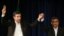 Iranian President Mahmoud Ahmadinejad, right, joins hands with his close ally Esfandiar Rahim Mashaei, as he flashes a victory sign, at the start of a press conference, May 11, 2013.