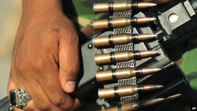 The ammunition of a rebel fighter is seen as he arrives at Green Square in the Kish, Benghazi July 6, 2011, from all the freed areas of Libya to demonstrate against Muammar Gaddafi and his regime.
