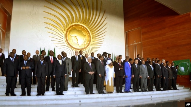 Heads of the African States pose for a group picture in Addis Ababa, Ethiopia, January, 27, 2013, during the African Union Conference. 