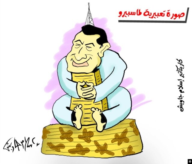 "An expressionist photo of Maspero." Maspero is the Egyptian TV and Radio building, seen here with Mubarak wrapped around it. (Islam Gawish)