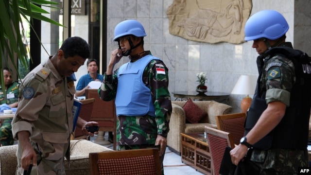 Members of the UN Supervision Mission in Syria in Damascus