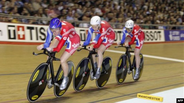 Britain's Sarah Storey, front, is a gold medal winning disabled cyclist and swimmer