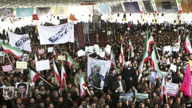 Iranians take part in the funeral of Sanee Zhaleh, a student who was shot dead during an opposition rally on in Tehran, February 16, 2011