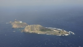 Handout photograph shows the disputed islets, known as Senkaku in Japan and Diaoyu in China, Dec. 13, 2012.