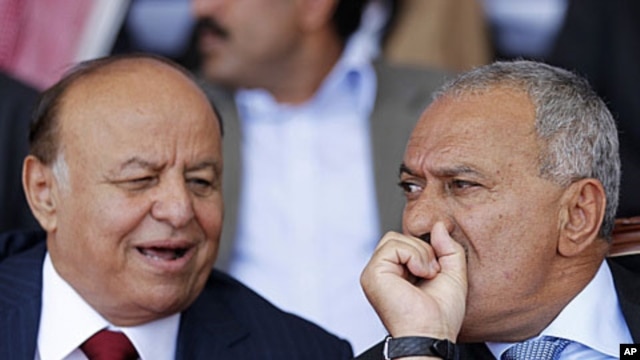 Yemen's Vice President Abed Rabo Mansour Hadi, left, pictured here with President Ali Abdullah Saleh during a gathering of Saleh's supporters in Yemen's capital Sana'a on March 10, 2011