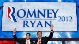 Republican presidential nominee Mitt Romney and vice presidential nominee Paul Ryan wave to delegates after speaking at the Republican National Convention in Tampa, Florida, August 30, 2012.