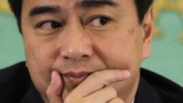 Former Thai Prime Minister Abhisit Vejjajiva attends a news conference at the Japan National Press Club in Tokyo, March 2, 2012.
