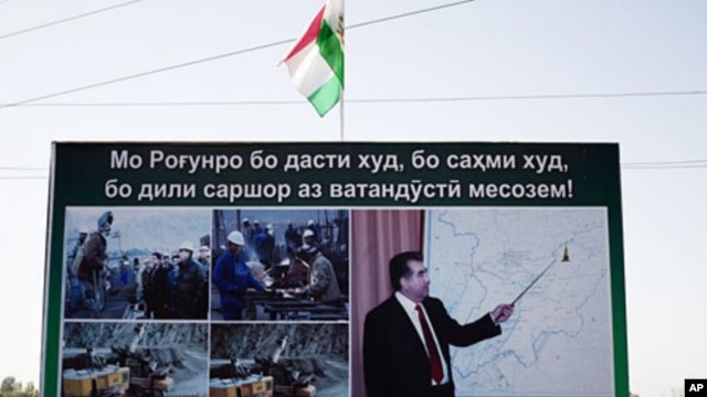 A propaganda poster for the Rogun dam project outside of Dushanbe features Tajikistan's president and builder in chief Emomalii Rahmon, October 1, 2011.