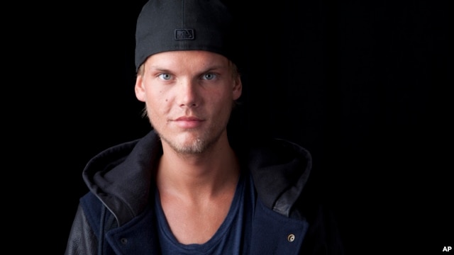 Swedish DJ, remixer and record producer Avicii poses for a portrait, Aug. 30, 2013 in New York.
