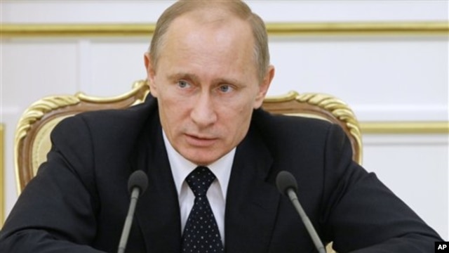 Russian Prime Minister Vladimir Putin chairs a Cabinet meeting in Moscow, 25 Jan 2011