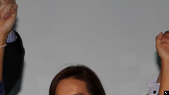 Josefina Vasquez Mota, of Mexico's ruling National Action Party, PAN, celebrates  after being nominated as presidential candidate by her party in Mexico City, Sunday, Feb. 5, 2012.