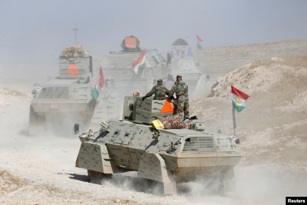 Peshmerga forces advance in the east of Mosul to attack Islamic State militants in Mosul, Iraq, Oct. 18, 2016.