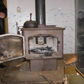 Old-style wood stoves like this one can still be found in U.S. homes.