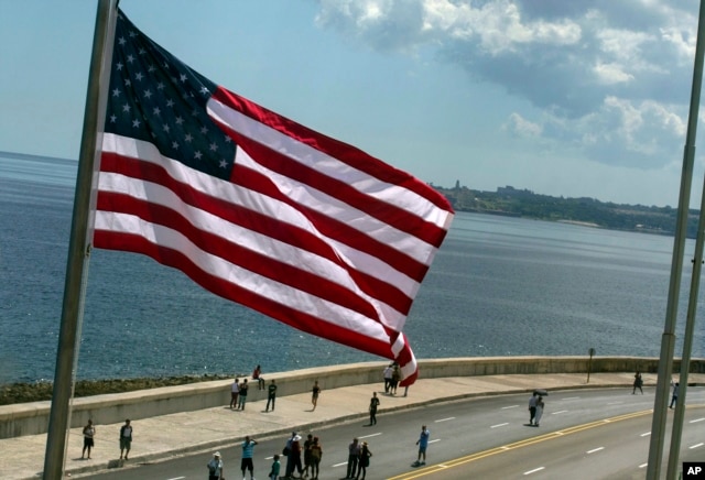 The U.S. flag waves outside the newly opened U.S. Embassy, overlooking Havana's seaside boulevard, the Malecon in Cuba, Aug. 14, 2015.