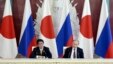 Japanese Prime Minister Shinzo Abe speaks at a news conference with Russian President Vladimir Putin in Moscow