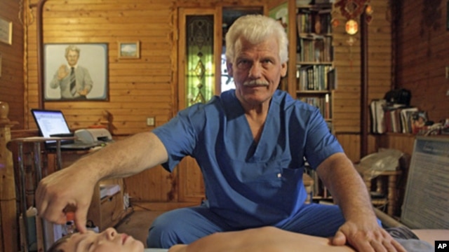 A Russian healer at work (file photo)