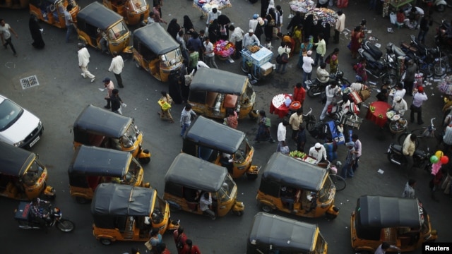 Autorickshaws much like these in central Hyderabad, India, are scheduled for a February 2013 pilot-program launch in the trendy Melville suburb of Johannesburg, South Africa, March 6, 2012.